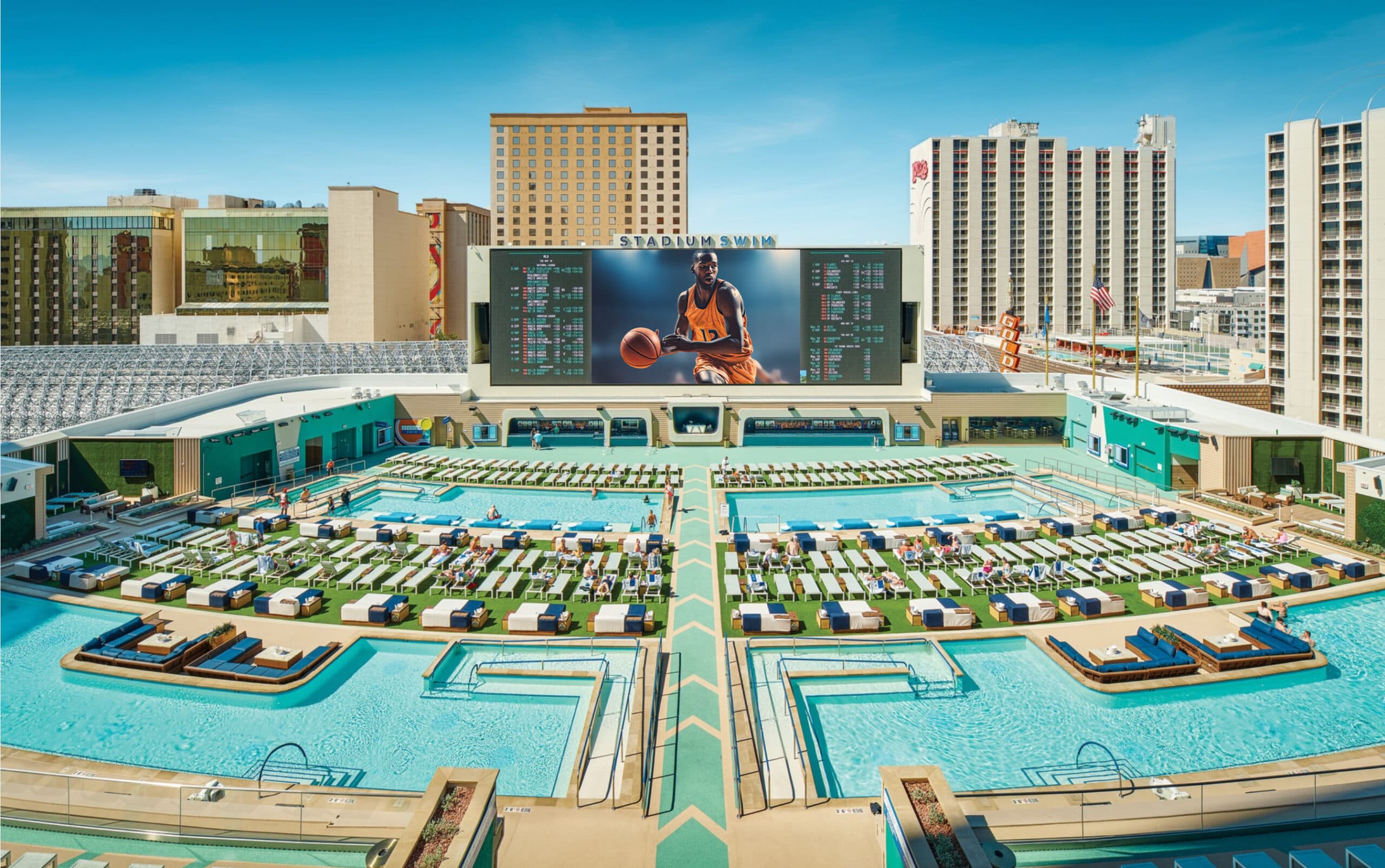 Stadium Swim at Circa: pools, group seating, and the giant sports screen